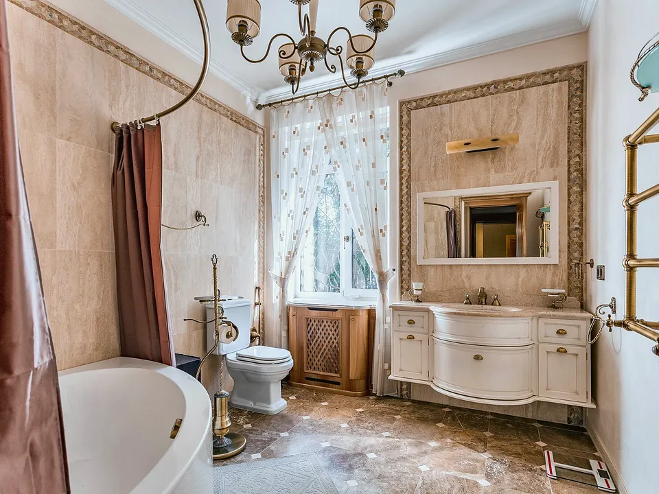 Vintage bathroom with wood cabinetry and a freestanding tub
