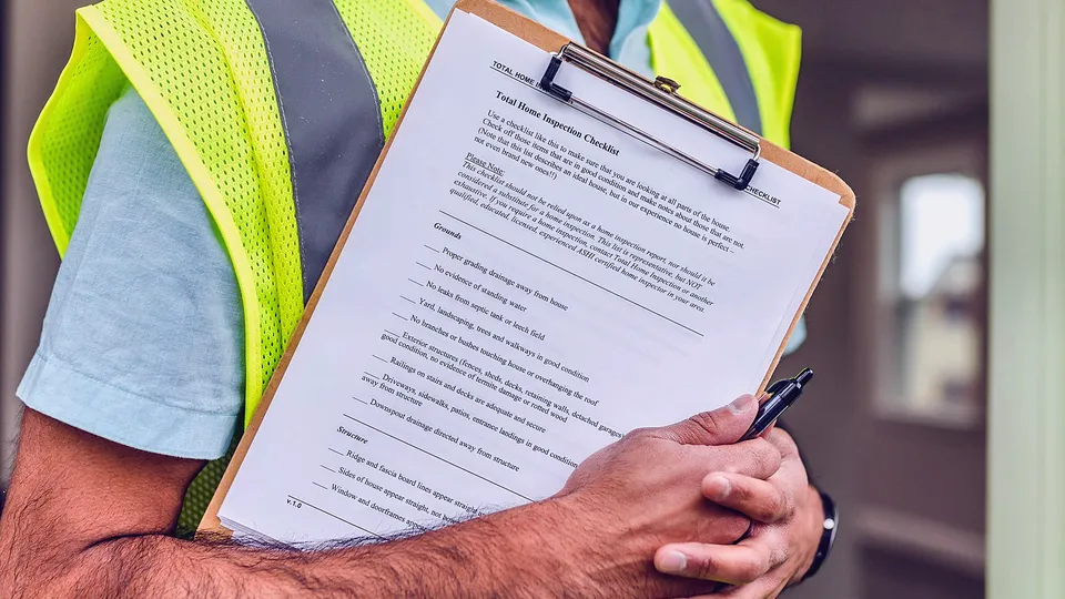Close-up of a home inspection checklist on a clipboard