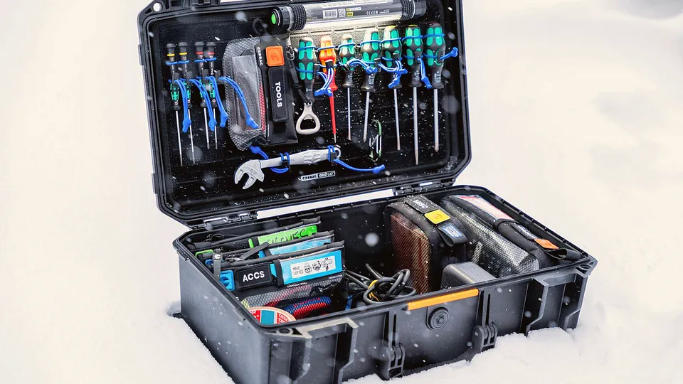 Open tool case with screwdrivers and bits