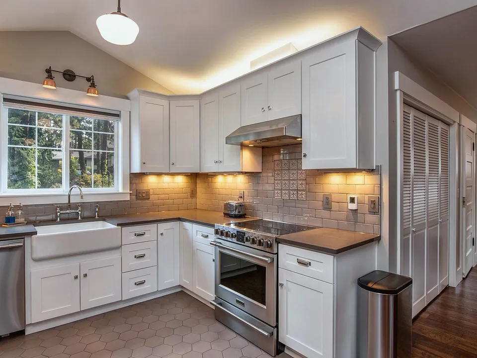 Kitchen with warm recessed lights over the counters