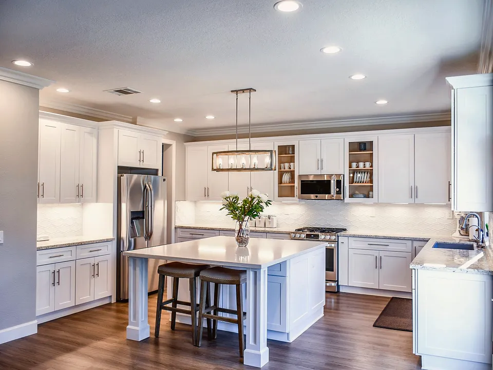 Bright kitchen lit by ceiling lights