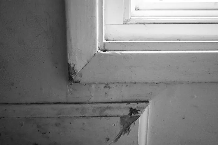 Baseboard trim meeting a wall corner