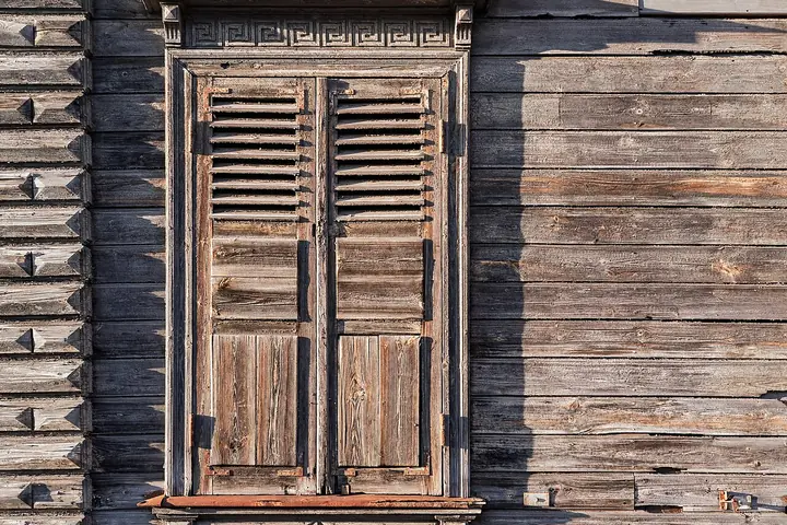 Hinges on an old wooden shutter
