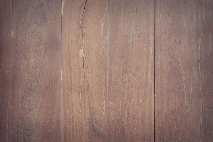 Close view of brown wood plank flooring